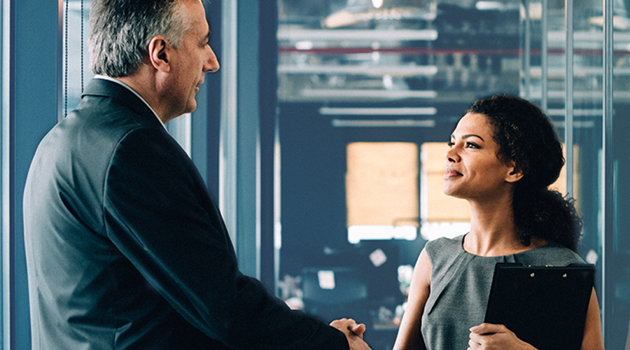 Image of employer and job seeker shaking hands